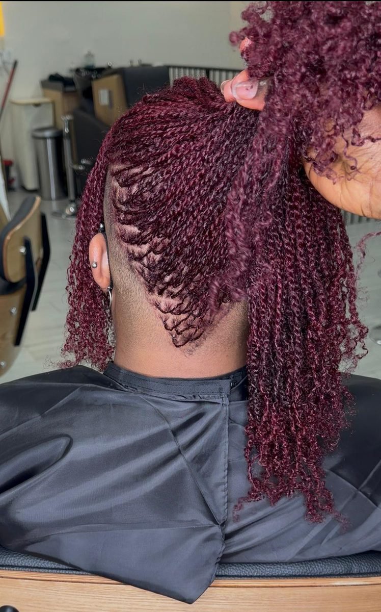 Client with copper ombre colored loc bob