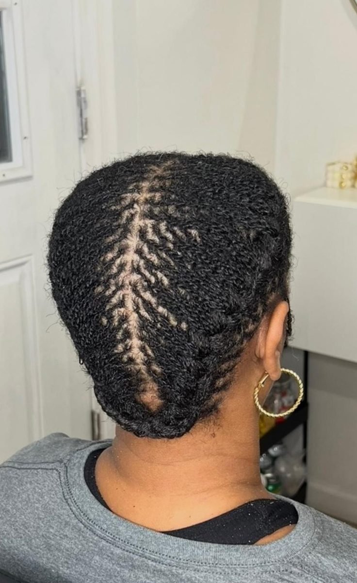 Close-up of a precise chevron parting pattern for a loc retie